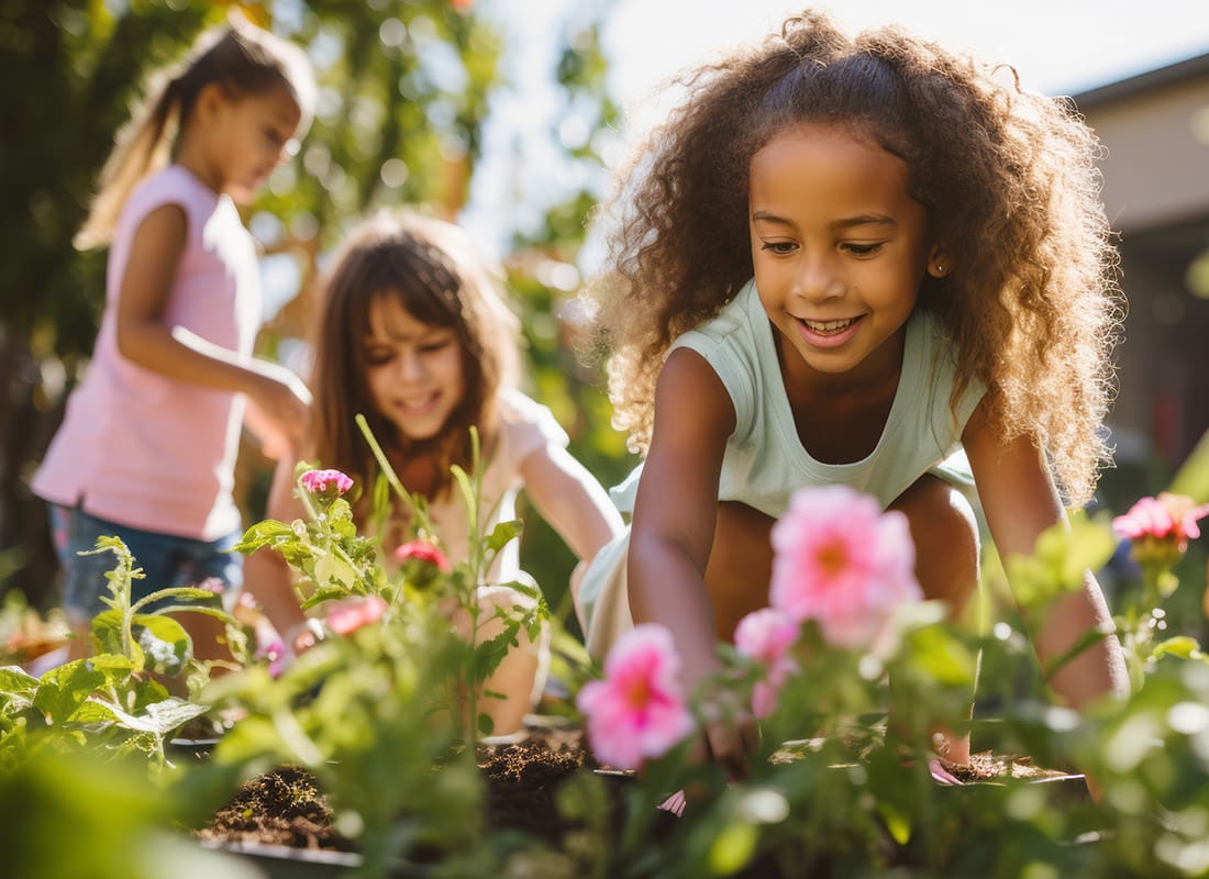 Community Involvement - Group of Kids Tending to a Garden on a Sunny Day